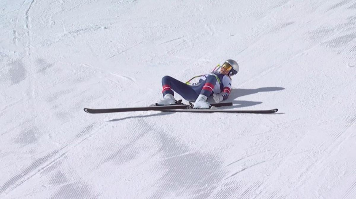 This handout video grab from IOC/OBS shows US Lindsey Vonn crashing during the women's downhill event at the Milano Cortina 2026 Winter Olympic Games in Cortina d'Ampezzo on February 8, 2026.  Handout / OIS/IOC / OBS / AFP