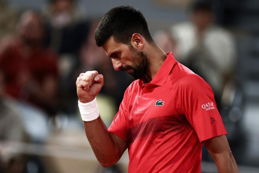 Serbia's Novak Djokovic reacts after a point during his men's singles quarter-final match against Germany's Alexander Zverev on day 11 of the French Open tennis tournament on Court Philippe-Chatrier at the Roland-Garros Complex in Paris on June 4, 2025.  Thibaud MORITZ / AFP