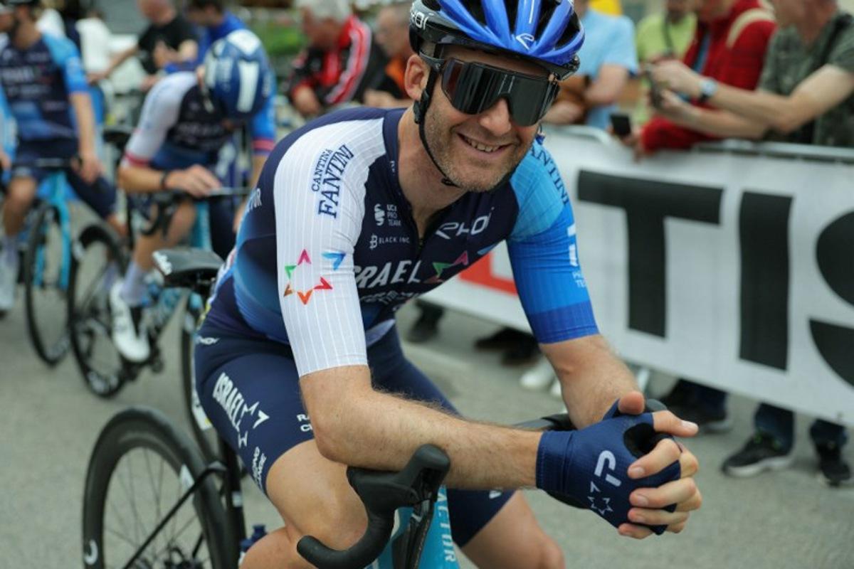 Team Israel Premier Tech's Canadian rider Hugo Houle waits for the start of the sixth stage of the 76th edition of the Criterium du Dauphine cycling race in Hauterives, on June 7, 2024.  Thomas SAMSON / AFP