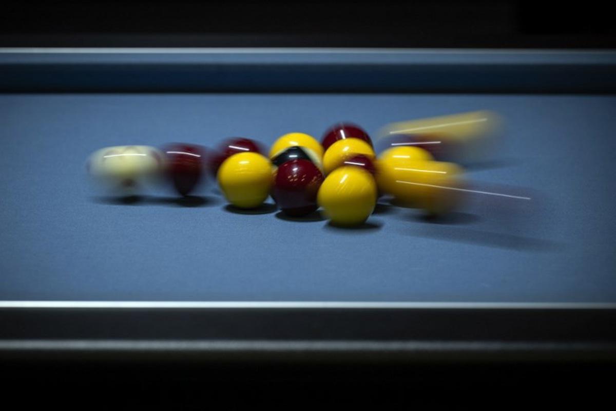 This photograph shows billiards' balls during the world blackball championships in Albi, southwestern France, on October 13, 2022.  The world blackball championships take place in Albi from October 8 to 15, 2022. Lionel BONAVENTURE / AFP