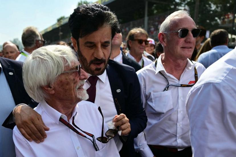 British former chief executive of the Formula One Group Bernie Ecclestone and FIA president Mohammed Ben Sulayem (C) attend the Italian Formula One Grand Prix race at Autodromo Nazionale Monza circuit, in Monza on September 1, 2024.  Andrej ISAKOVIC / AFP