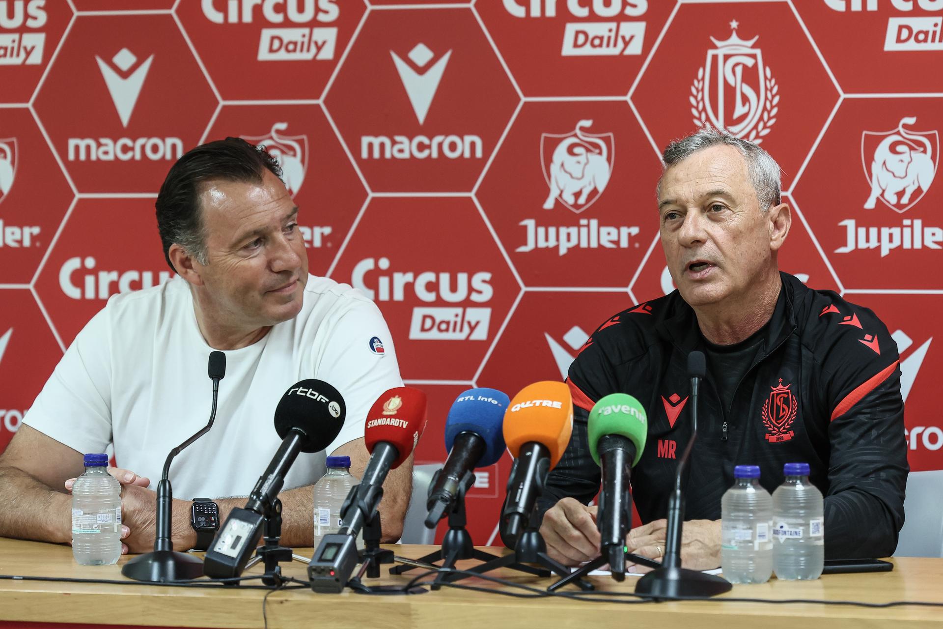 Standard's new sport director Marc Wilmots and Standard's head coach Mircea Rednic pictured during a press conference by Belgian soccer team Standard de Liege to introduce their new head coach, Thursday 26 June 2025 in Liege. Romanian Rednic will start his second stint in Liege. BELGA PHOTO BRUNO FAHY