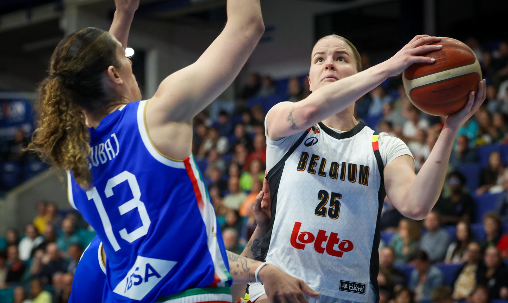 Italy's Lorela Cubaj and Belgium's Emma Meesseman fight for the ball during a friendly basket game between Belgium's national team Belgian Cats and Italy, in Jemappes, on Friday 23 May 2025. BELGA PHOTO VIRGINIE LEFOUR