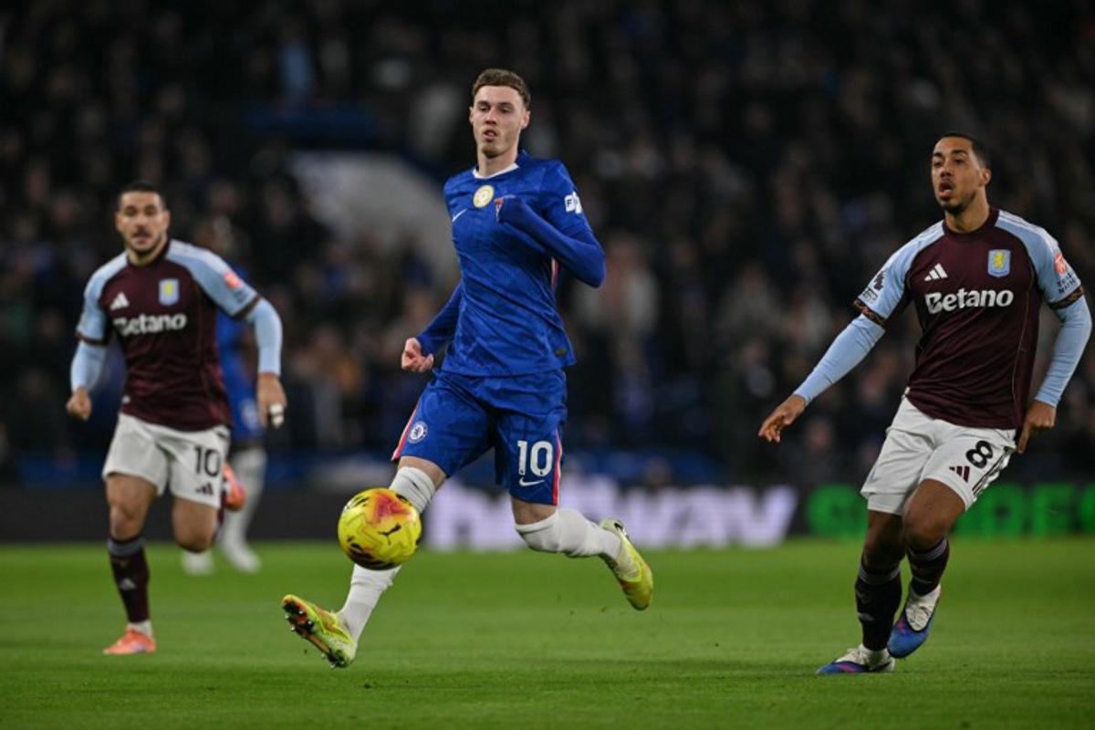 Chelsea's English midfielder #10 Cole Palmer (C) is challenged by Aston Villa's Belgian midfielder #08 Youri Tielemans (R) and Aston Villa's Argentinian midfielder #10 Emiliano Buendia (L) during the English Premier League football match between Chelsea and Aston Villa at Stamford Bridge in London on December 27, 2025.  Glyn KIRK / AFP