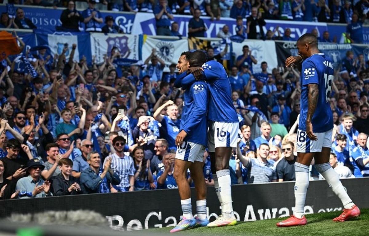 Everton's Senegalese striker #10 Iliman Ndiaye (L) celebrates scoring the team's second goal during the English Premier League football match between Everton and Southampton at Goodison Park in Liverpool, north west England on May 18, 2025, Everton's final premier league fixture played at the stadium, their home since 1892.  Paul ELLIS / AFP