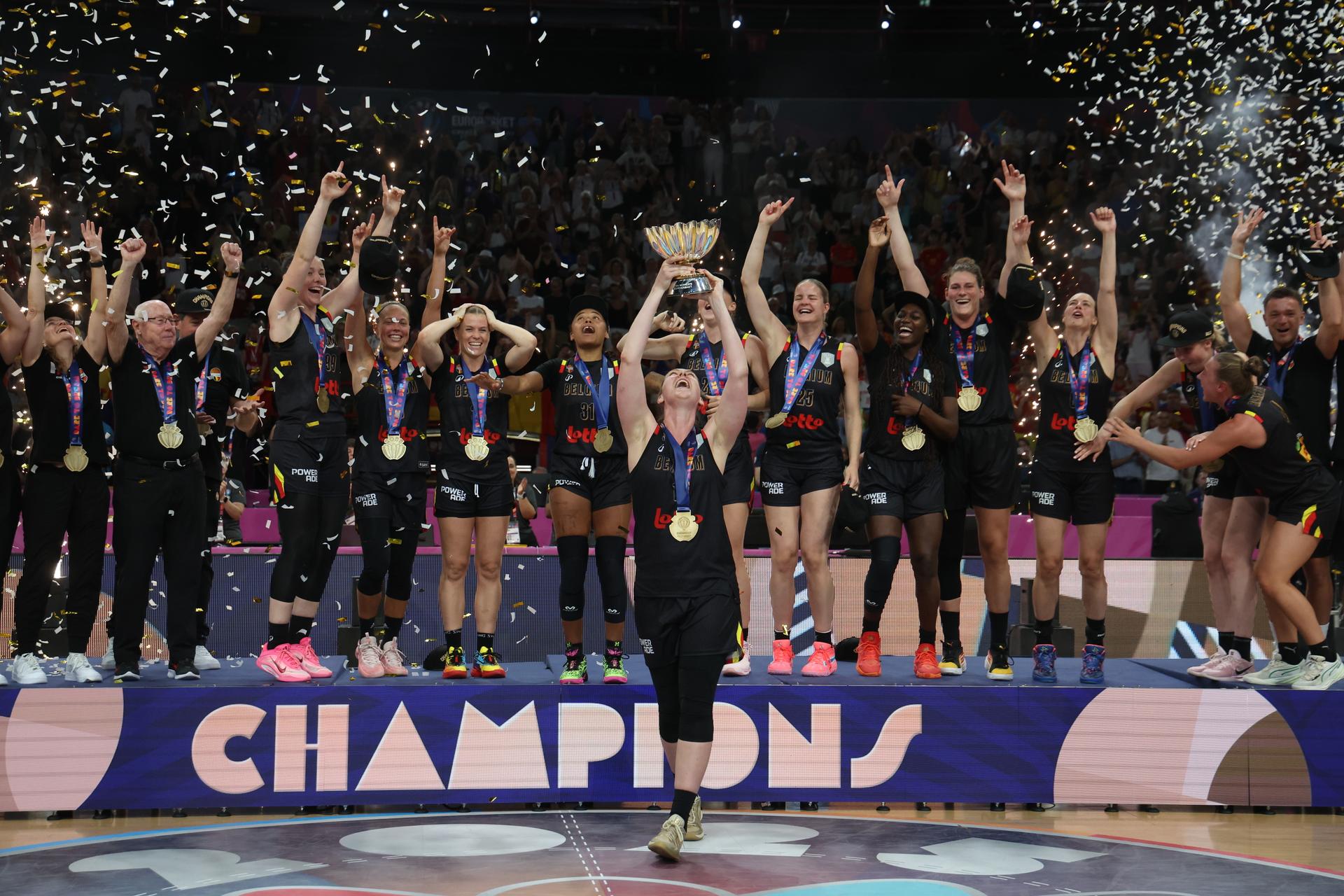 Belgium's captain Emma Meesseman celebrates this the cup on the podium after winning a basketball match between Spain and Belgian national team 'the Belgian Cats' on Sunday 29 June 2025 in Piraeus, Greece, the final of the FIBA Women's EuroBasket 2025.  BELGA PHOTO VIRGINIE LEFOUR