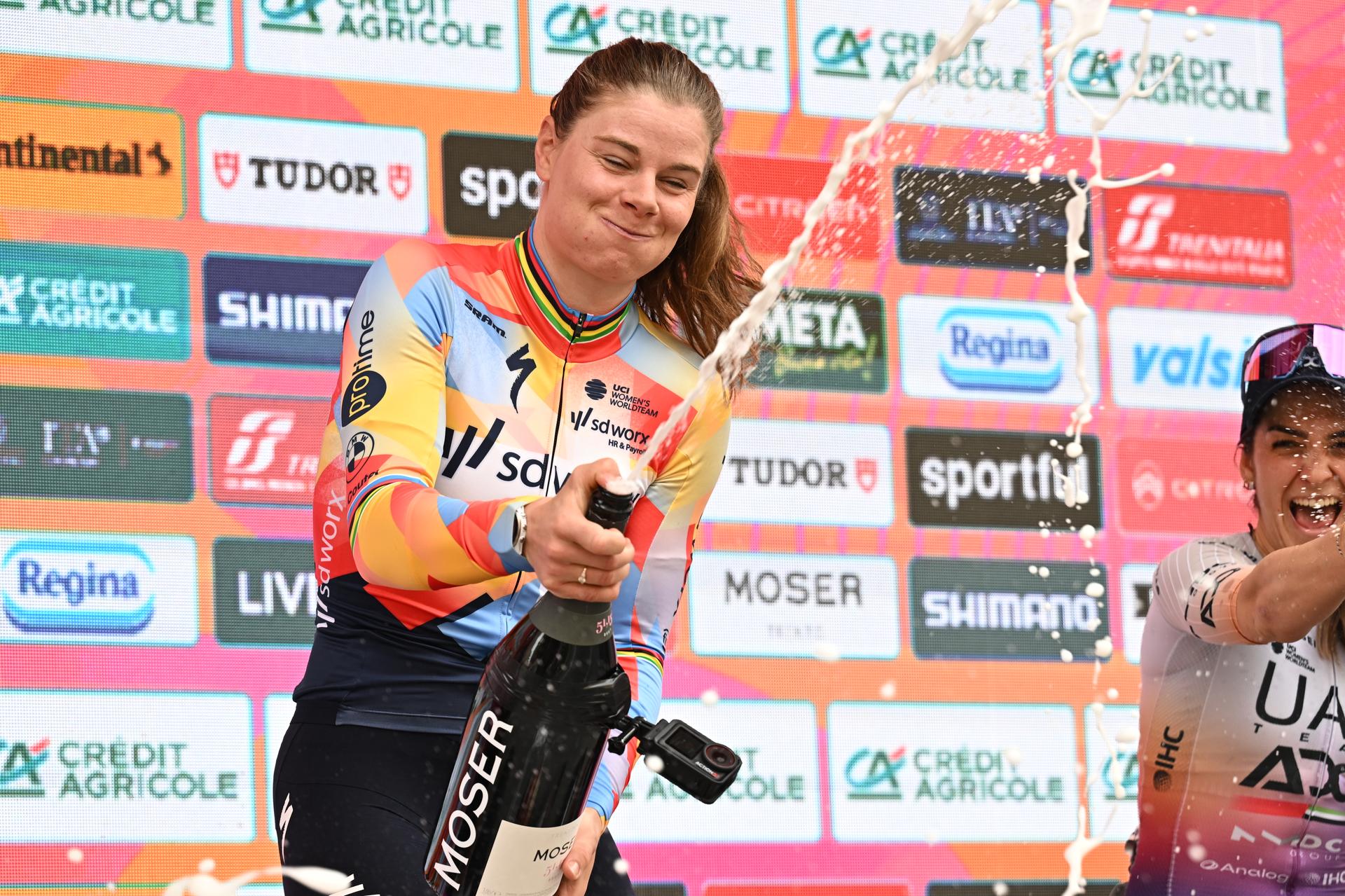 Belgian Lotte Kopecky celebrates on the podium after winning the 'Milano-Sanremo' one day cycling race for women, from Milan to San Remo, Italy, Saturday 21 March 2026. BELGA PHOTO DAVID PINTENS
