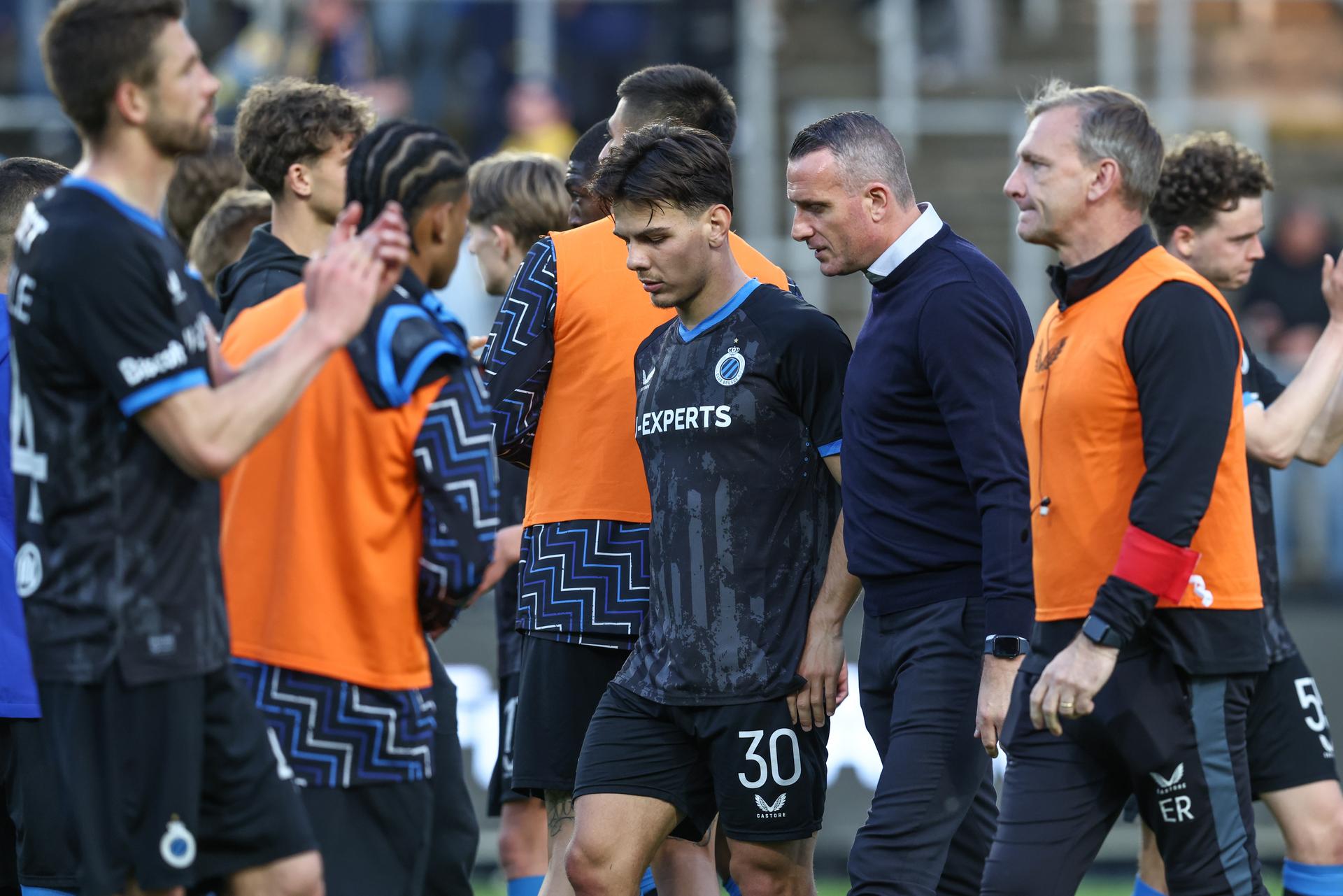 Club's players look dejected after a soccer match between Royale Union Saint-Gilloise and Club Brugge, Sunday 27 April 2025 in Brussels, on day 6 (out of 10) of the Champions' Play-offs of the 2024-2025 'Jupiler Pro League' first division of the Belgian championship. BELGA PHOTO BRUNO FAHY