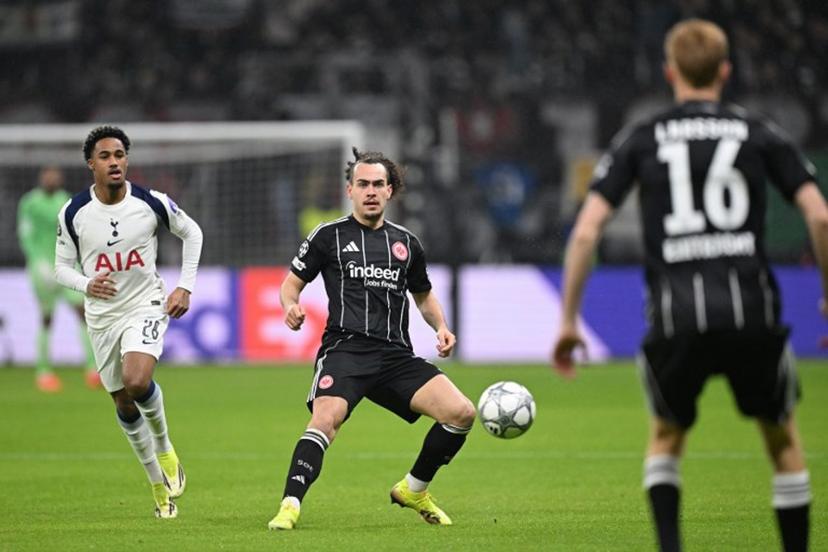 Frankfurt's Belgian defender #03 Arthur Theate (C) controls the ball during the UEFA Champions League league phase- day 8 football match between Eintracht Frankfurt and Tottenham Hotspur in Frankfurt, western Germany, on January 28, 2026.  Kirill KUDRYAVTSEV / AFP