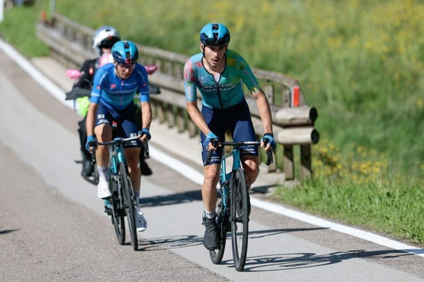 XDS Astana Team's Italian rider Christian Scaroni (R) rides ahead XDS Astana Team's Italian rider Lorenzo Fortunato in the ascent of San Valentino during the 16th stage of the 108th Giro d'Italia cycling race of 203kms from Piazzola sul Brenta to San Valentino on May 27, 2025.  Luca Bettini / AFP