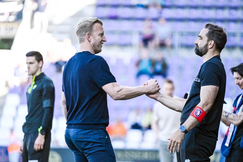 Beerschot's head coach Dirk Kuyt and Beerschot's assistant coach Frank Magerman celebrate after winning a soccer match between Beerschot VA and Cercle Brugge, Saturday 10 May 2025 in Antwerp, on day 6 (out of 6) of the Relegation Play-offs of the 2024-2025 'Jupiler Pro League' first division of the Belgian championship. BELGA PHOTO TOM GOYVAERTS
