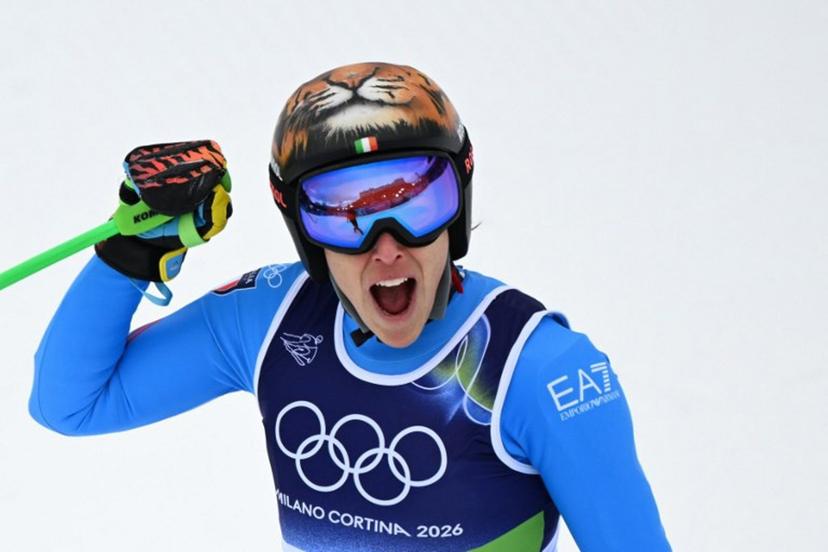 Italy's Federica Brignone reacts in the finish area after competing in on the podium of the women's super-G event during the Milano Cortina 2026 Winter Olympic Games at the Tofane Alpine Skiing Centre in Cortina d'Ampezzo on February 12, 2026.  François-Xavier MARIT / AFP