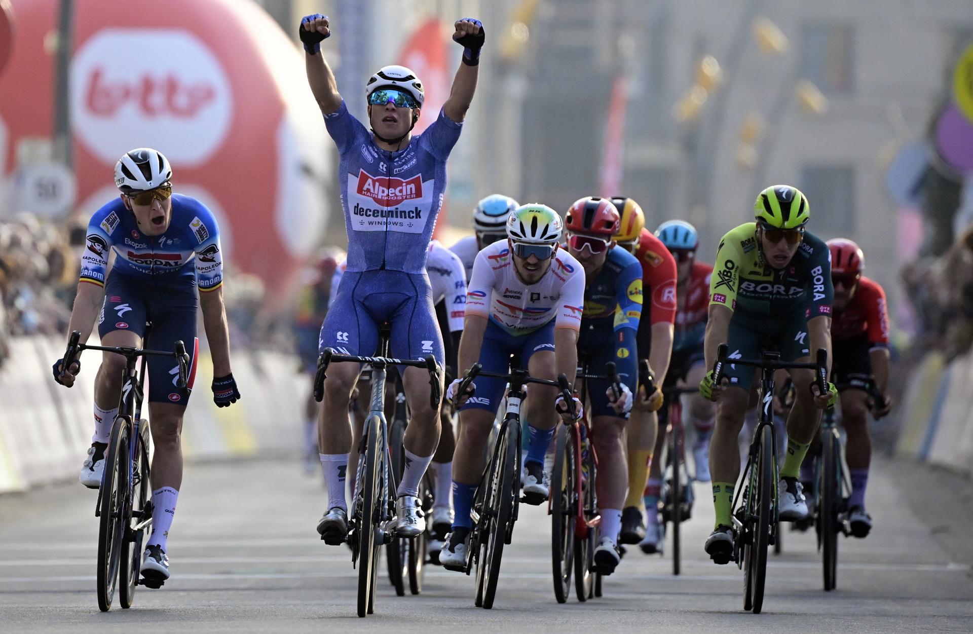Belgian Jasper Philipsen of Alpecin-Deceuninck celebrates after winning the 'Classic Brugge-De Panne' men's elite one-day cycling race, 198,9 km from Brugge to De Panne, Wednesday 20 March 2024. BELGA PHOTO DIRK WAEM