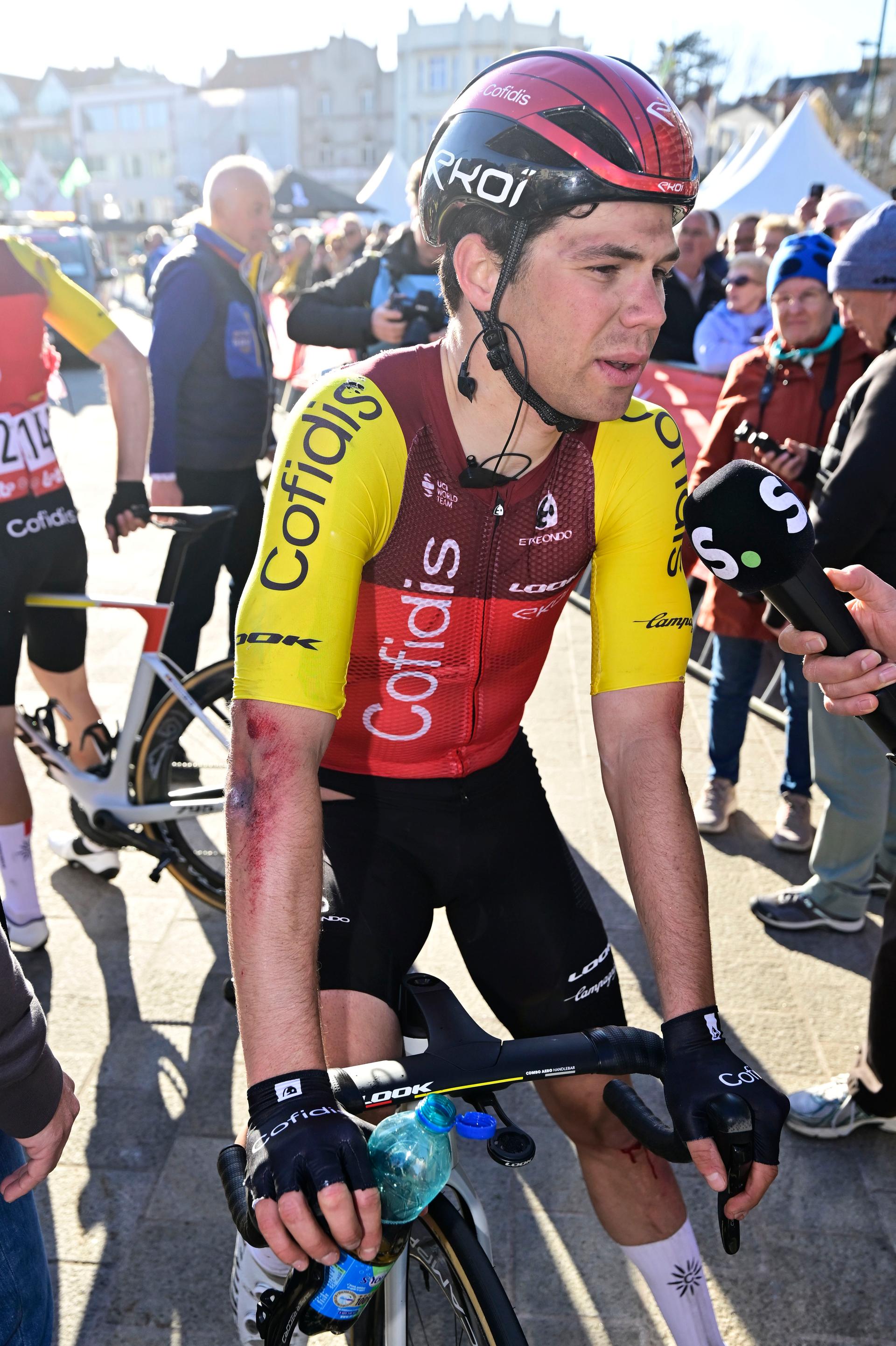 Belgian Milan Fretin of Cofidis pictured after a fall during the 'Classic Brugge-De Panne' men's elite one-day cycling race, 195,6 km from Brugge to De Panne, Wednesday 26 March 2025. BELGA PHOTO DIRK WAEM