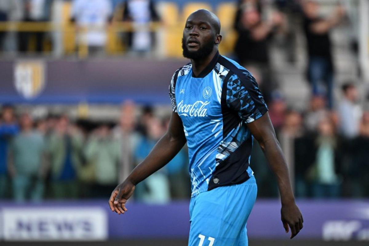 Napoli's Belgian forward #11 Romelu Lukaku warms up before the Italian Serie A football match between Parma and Napoli at the Tardini stadium in Parma on May 18, 2025.  Piero CRUCIATTI / AFP