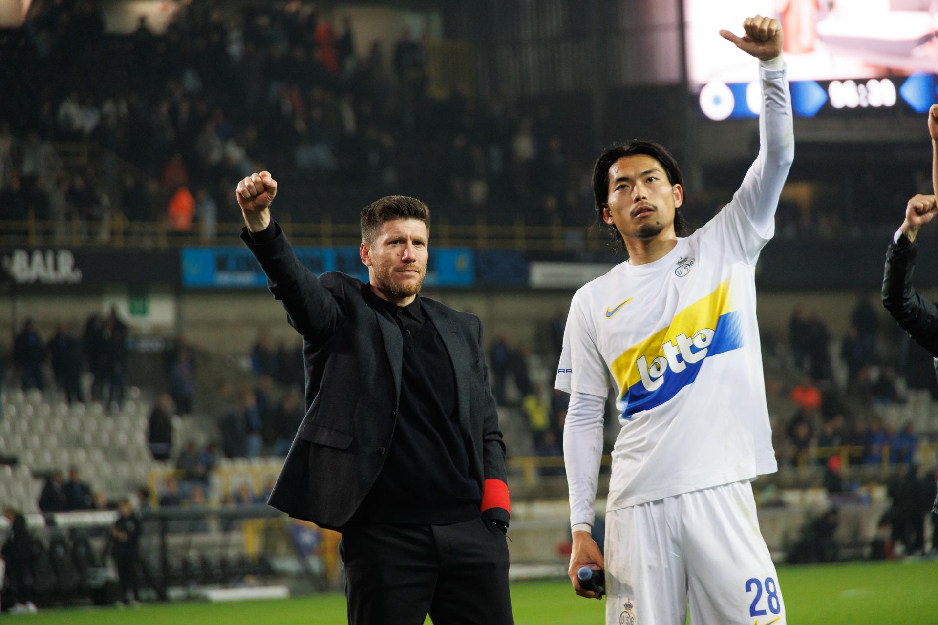 Union's head coach Sebastien Pocognoli and Union's Koki Machida celebrate after winning a soccer match between Club Brugge and Royale Union Saint-Gilloise, Thursday 24 April 2025 in Brugge, on day 5 (out of 10) of the Champions' Play-offs of the 2024-2025 'Jupiler Pro League' first division of the Belgian championship. BELGA PHOTO KURT DESPLENTER