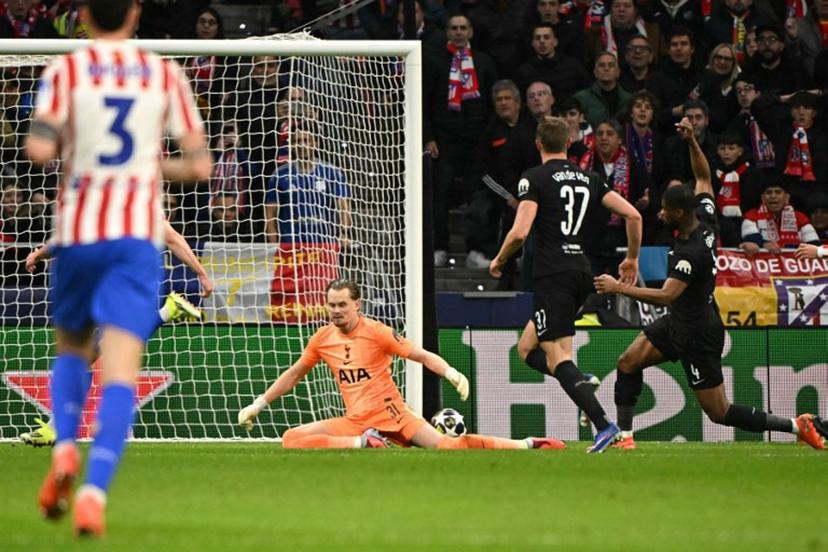 Tottenham Hotspur's Czech goalkeeper #31 Antonin Kinsky concedes the second goal scored by Atletico Madrid's French forward #07 Antoine Griezmann during the UEFA Champions League last 16 first leg football match between Club Atletico de Madrid and Tottenham Hotspur at Metropolitano Stadium in Madrid on March 10, 2026.  Javier SORIANO / AFP
