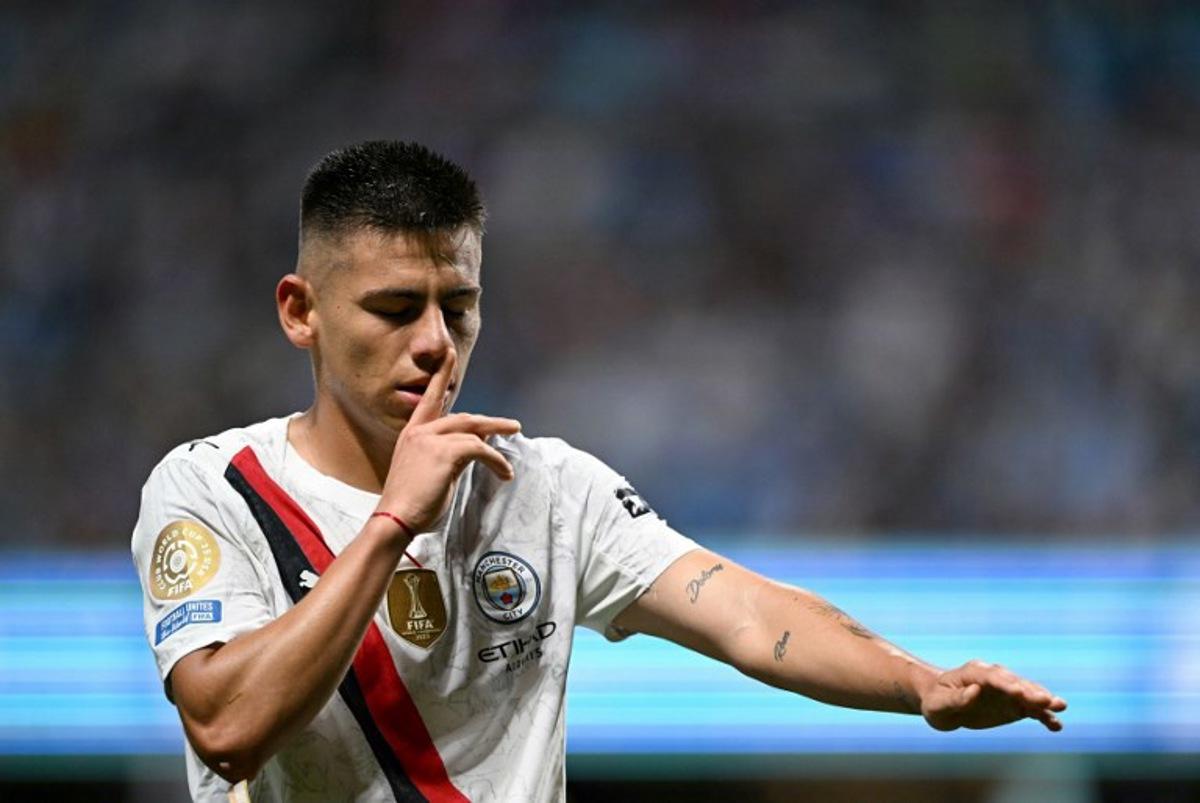 Manchester City's Argentine midfielder #30 Claudio Echeverri celebrates scoring his team's second goal during the FIFA Club World Cup 2025 Group G football match between England's Manchester City and UAE's Al Ain FC at the Mercedes-Benz stadium in Atlanta on June 22, 2025.  PATRICIA DE MELO MOREIRA / AFP