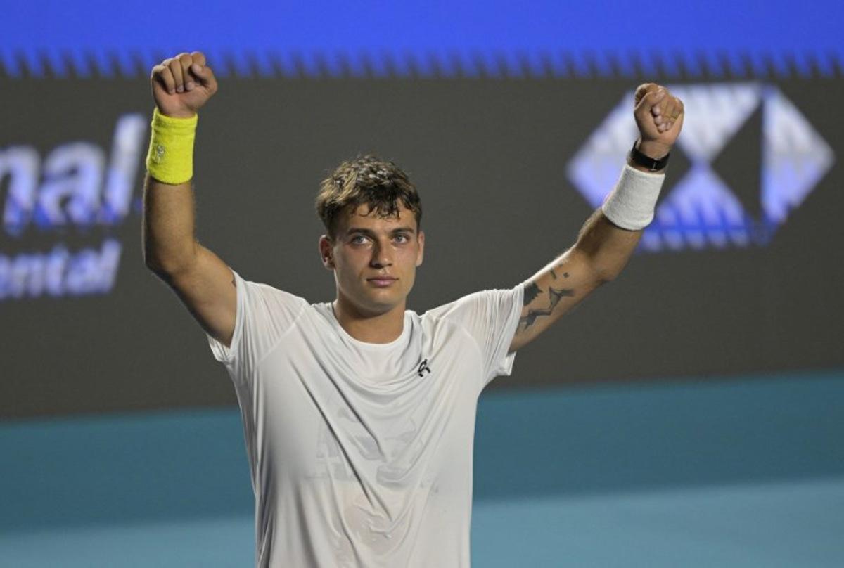 Italy's Flavio Cobolli celebrates after defeating Serbian Miomir Kecmanovic during the 2026 Mexico ATP 500 Tennis Open men's singles tennis semi-final match at the Arena GNP Seguros in Acapulco, Guerrero State, Mexico on February 27, 2026.  Alfredo ESTRELLA / AFP