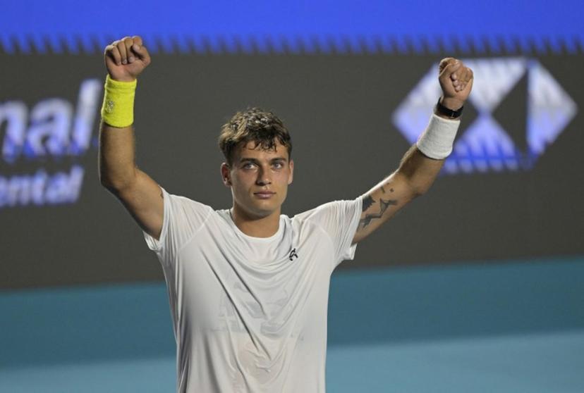 Italy's Flavio Cobolli celebrates after defeating Serbian Miomir Kecmanovic during the 2026 Mexico ATP 500 Tennis Open men's singles tennis semi-final match at the Arena GNP Seguros in Acapulco, Guerrero State, Mexico on February 27, 2026.  Alfredo ESTRELLA / AFP