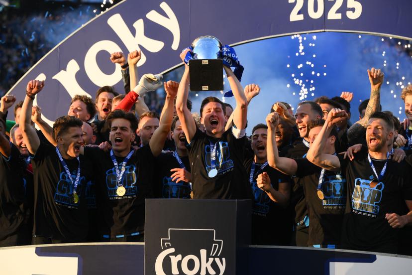 Club's players celebrate on the podium after winning a soccer game between Club Brugge and RSC Anderlecht in Brussels, Sunday 04 May 2025, the final of the 'Croky Cup' Belgian soccer cup. BELGA PHOTO JOHN THYS