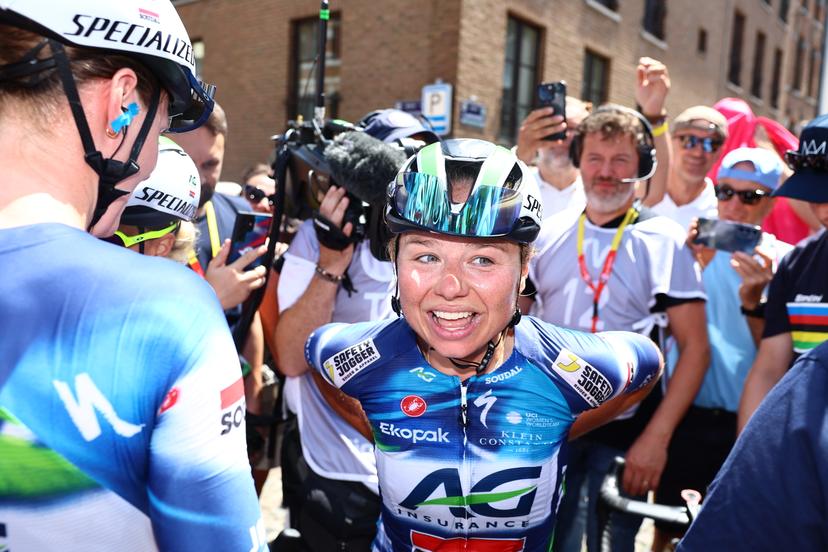 Belgian Justine Ghekiere celebrates after winning the women's elite road race of the Belgian Cycling Championships, 132,8 km from and to the Grand Place square in Binche on Sunday 29 June 2025. BELGA PHOTO DAVID PINTENS