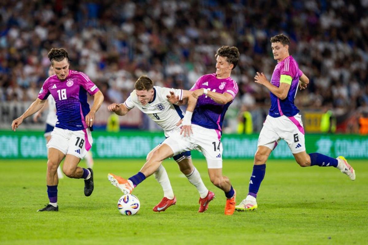 (L-R) Germany's midfielder #18 Rocco Reitz, England's midfielder #08 Elliot Anderson, Germany's defender #14 Tim Oermann and Germany's midfielder #06 Eric Martel vie for the ball during the UEFA U21 European Championship final football match between England and Germany in Bratislava, Slovakia on June 28, 2025.  Branislav Racko / AFP
