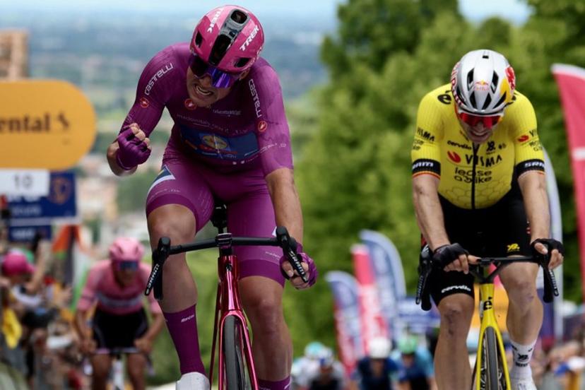 Lidl-Trek's Danish rider Mads Pedersen (L) celebrates after victory as he crosses the finish of the 13th stage of the 108th Giro d'Italia cycling race of 180kms from Rovigo to Vicenza on May 23, 2025. Lidl-Trek's Danish rider Mads Pedersen won the stage ahead of Team Visma-Lease a Bike's Belgian rider Wout Van Aert and UAE Team Emirates XRG's Mexican rider Isaac Del Toro. Luca Bettini / AFP