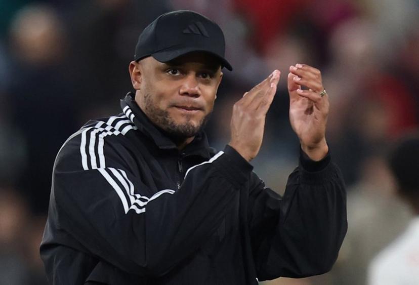 Bayern Munich's Belgian head coach Vincent Kompany applauds after the German first division Bundesliga football match between FC Augsburg and FC Bayern Munich in Augsburg, southern Germany, on April 4, 2025.  Alexandra BEIER / AFP