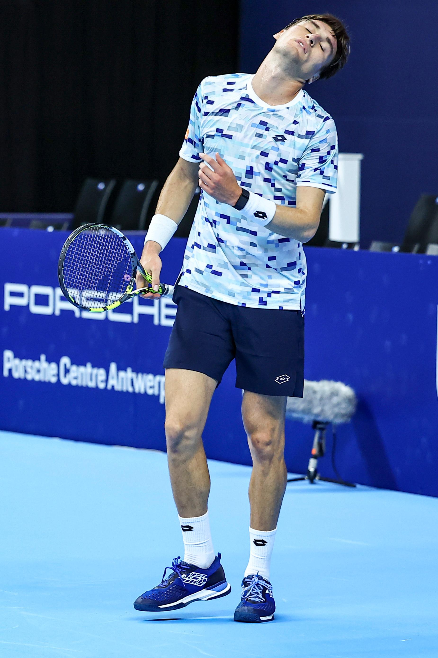 Belgian Raphael Collignon looks dejected during a tennis match in the round of 32 of the singles competition at the ATP European Open Tennis tournament in Antwerp, Monday 14 October 2024. BELGA PHOTO DAVID PINTENS