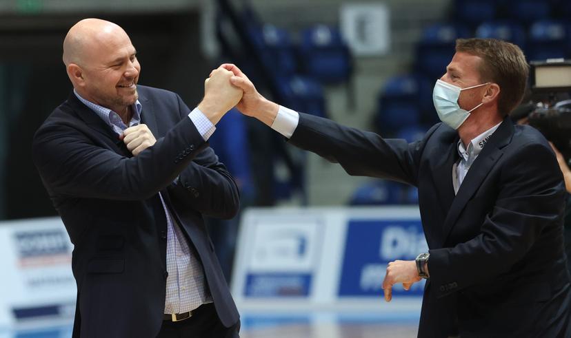 Mons' head coach Vedran Bosnic and Mons' assistant coach Frank De Meulemeester celebrate after winning the basketball match between Mons-Hainaut and Antwerp Giants, Friday 07 May 2021 in Mons, a game of day 16 of the second phase of the 'EuroMillions League' Belgian first division basket championships. BELGA PHOTO VIRGINIE LEFOUR
