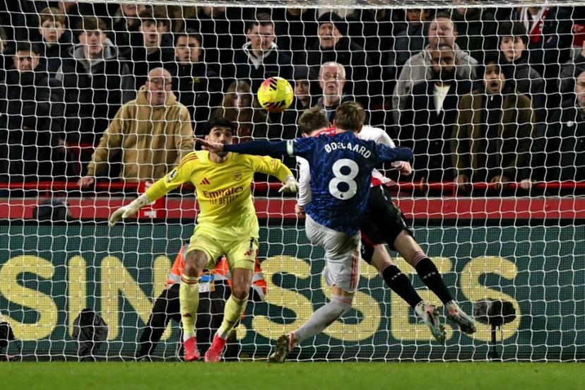 Brentford's English striker #23 Keane Lewis-Potter scores the team's first goal during the English Premier League football match between Brentford and Arsenal at the Gtech Community Stadium in London on February 12, 2026.  Glyn KIRK / AFP