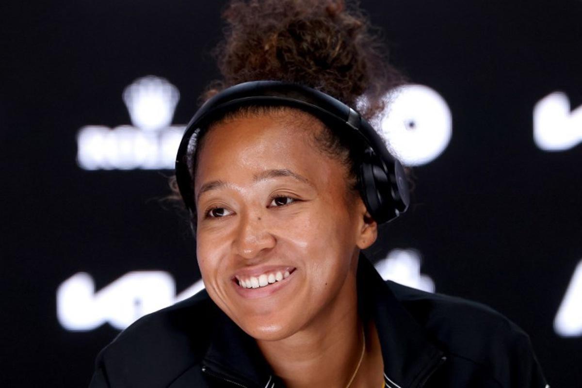 Japan's Naomi Osaka speaks at a press conference after her women's singles match against Switzerland's Belinda Bencic on day six of the Australian Open tennis tournament in Melbourne on January 17, 2025.  DAVID GRAY / AFP