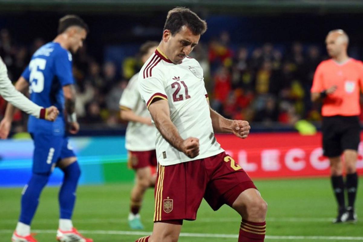 Spain's midfielder #21 Mikel Oyarzabal celebrates scoring the opening goal during the international friendly football match between Spain and Serbia at La Ceramica Stadium in Vila-real on March 27, 2026.  JOSE JORDAN / AFP