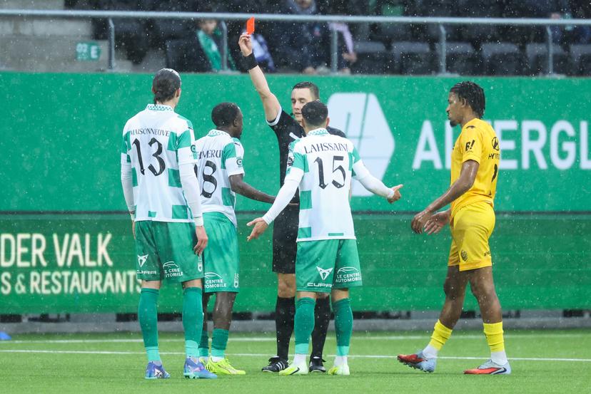 RAAL's Majeed Ashimeru receives a red card from and referee Michiel Allaerts during a soccer match between RAAL La Louviere and KV Mechelen, Sunday 22 February 2026 in La Louviere, on day 26 of the 2025-2026 'Jupiler Pro League' first division of the Belgian championship. BELGA PHOTO VIRGINIE LEFOUR