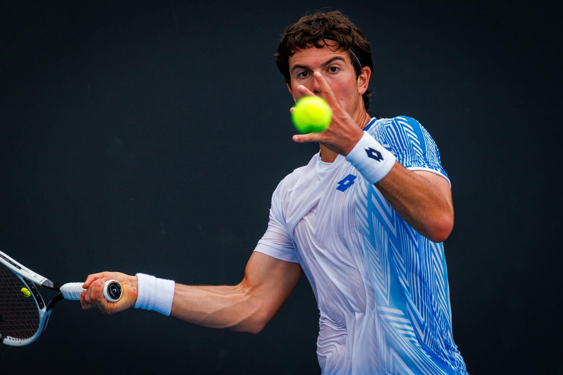 Belgium's Gilles-Arnaud Bailly pictured in action during a third round qualifying match in the men's singles against USA's Damm at the Australian Open, Melbourne Park, Melbourne on Thursday 15 January 2026.  BELGA PHOTO PATRICK HAMILTON  --- BENELUX ONLY   ---
