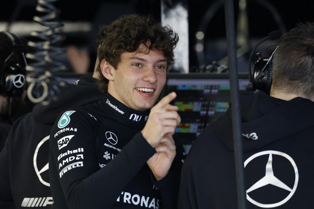 Mercedes' Italian driver Kimi Antonelli gestures in the pits before the start of the qualifying session ahead of the Formula One Japanese Grand Prix at the Suzuka circuit in Suzuka, Mie prefecture on March 28, 2026.  FRANCK ROBICHON / POOL / AFP