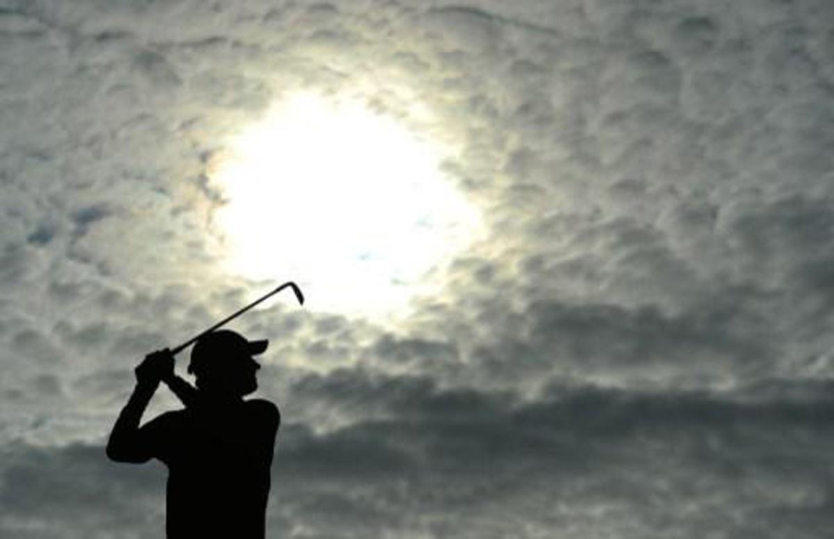 England's Chris Wood tees off on the second during the first round of the PGA Championship at Wentworth Golf Club in Surrey, southwest of London, on May 21, 2015. AFP PHOTO / GLYN KIRK