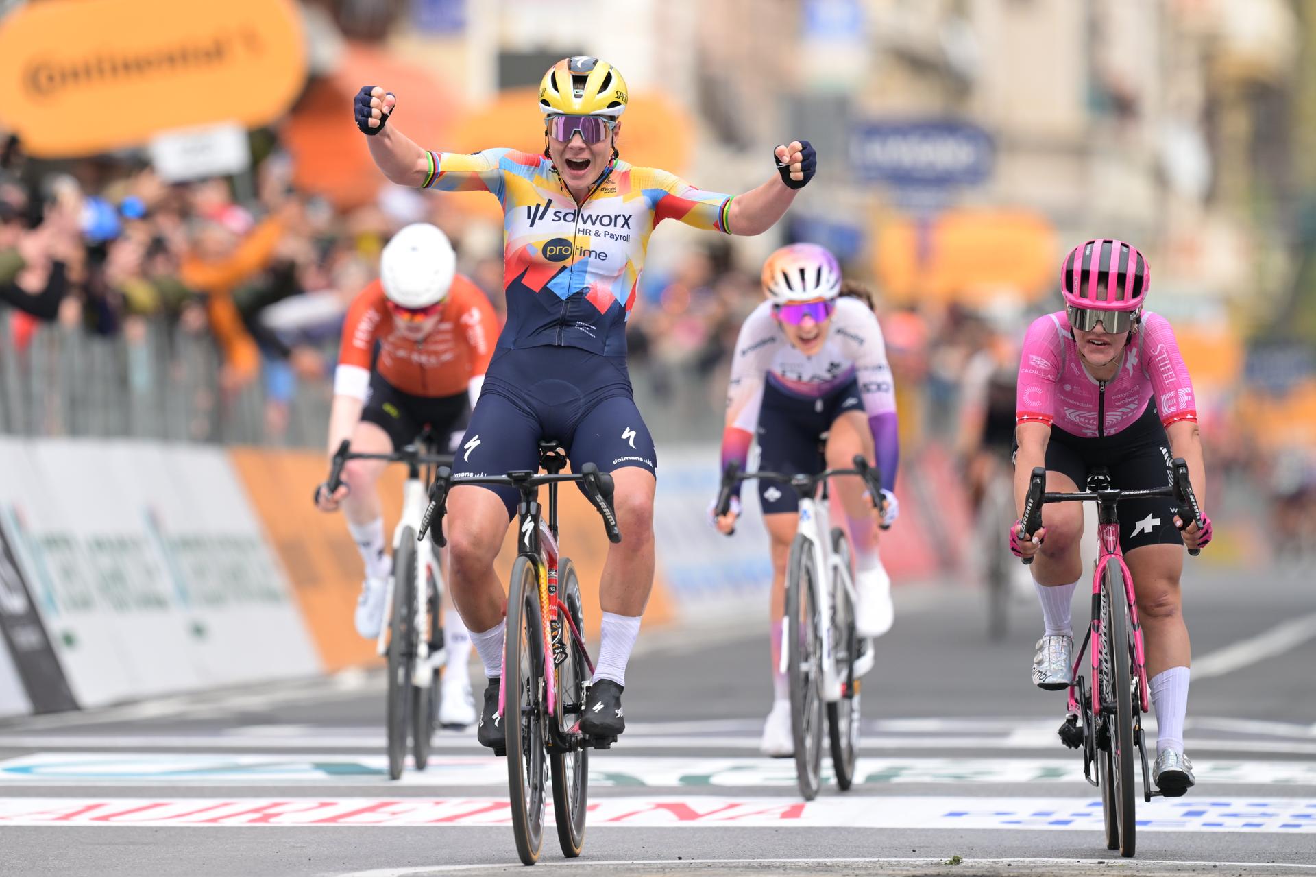 Belgian Lotte Kopecky celebrates as she crosses the finish line to win the 'Milano-Sanremo' one day cycling race for women, 298km from Milan to San Remo, Italy, Saturday 21 March 2026. BELGA PHOTO DAVID PINTENS