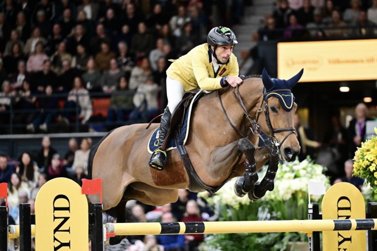 Brazil's Yuri Mansur on the horse Miss Blue-Saint Blue Farm competes during the World Cup jumping at the Gothenburg Horse Show in Scandinavium in Gothenburg, Sweden on February 23, 2025. Bjorn LARSSON ROSVALL / TT News Agency / AFP