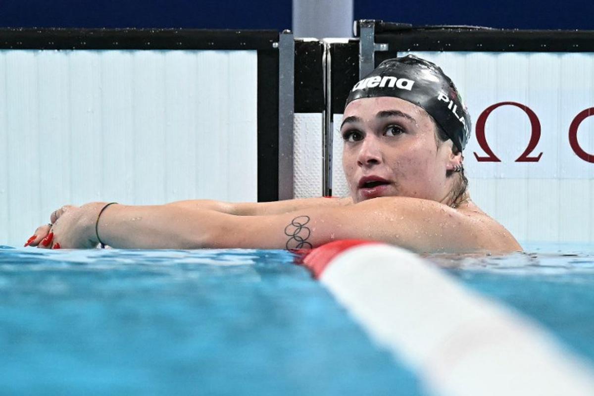 Italy's Benedetta Pilato reacts after competing in a semifinal of the men's 200m freestyle swimming event during the Paris 2024 Olympic Games at the Paris La Defense Arena in Nanterre, west of Paris, on July 28, 2024. Manan VATSYAYANA / AFP