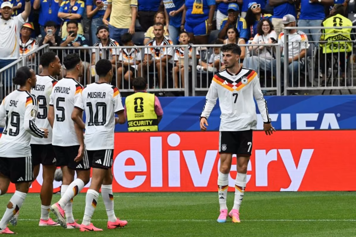 Germany's forward #07 Kai Havertz (R) celebrates with teammates after scoring a penalty kick for his team's third goal during the 2026 World Cup Group E football match between Germany and Curacao at the Houston Stadium in Houston on June 14, 2026. RONALDO SCHEMIDT / AFP