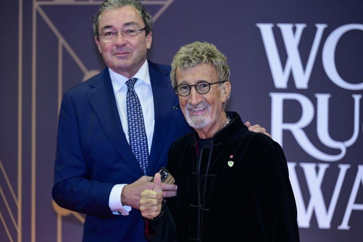 Irish businessman Eddie Jordan (R) poses on the red carpet of the 2024 World Rugby Awards ceremony at the Sporting Monte-Carlo complex in Monaco, on November 24, 2024. Frederic Dides / AFP