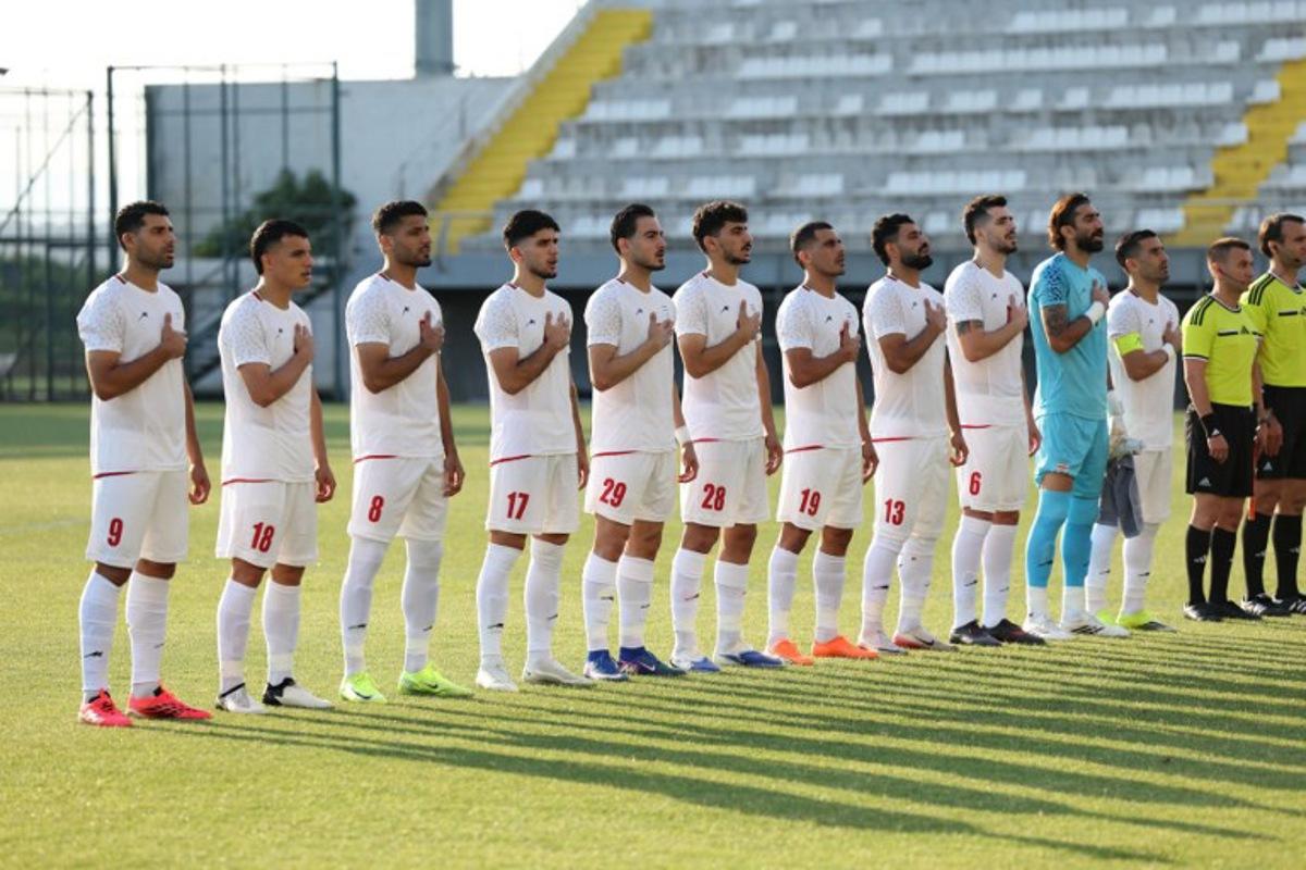 Iran's players stand during the national anthem before an international friendly football match between Iran and Gambia in Antalya, southern Turkey, on May 29, 2026, as part of the team's preparation for the upcoming football World Cup. Oner SAN / AFP