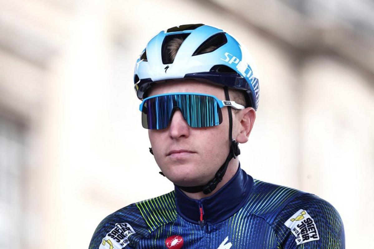 Soudal Quick-Step's Belgian rider Tim Merlier arrives at the start of the 123rd edition of the Paris-Roubaix one-day classic cycling race, 258.3 km between Compiègne and Roubaix, northern France, on April 12, 2026. Anne-Christine POUJOULAT / AFP