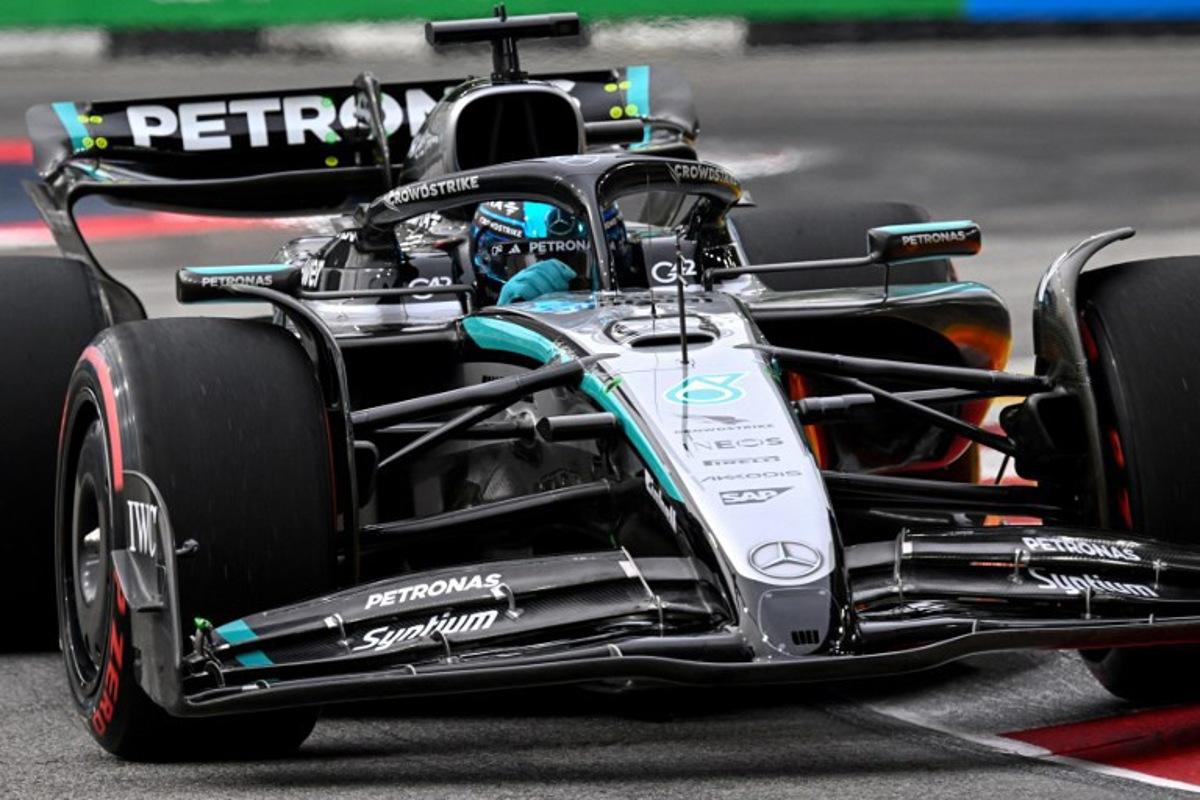 Mercedes' British driver George Russell drives during the third practice session ahead of the Formula One Singapore Grand Prix night race at the Marina Bay Street Circuit in Singapore on October 4, 2025. ROSLAN RAHMAN / AFP