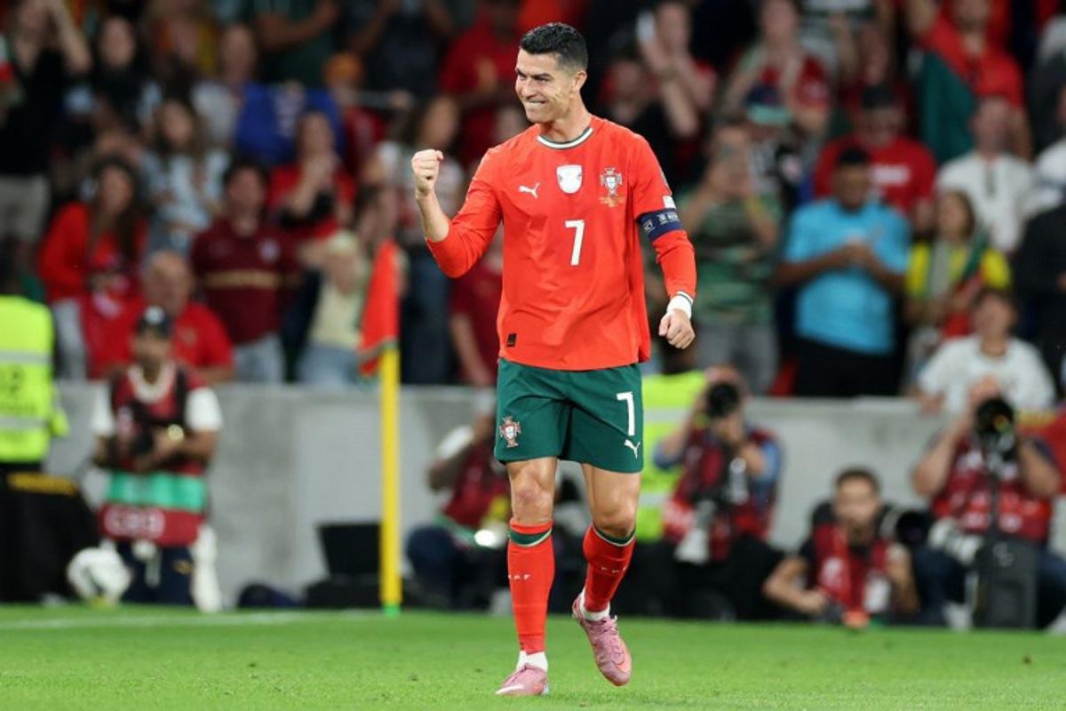 Portugal's forward #07 Cristiano Ronaldo celebrates scoring his team's second goal during the 2026 World Cup qualifiers Europe zone group F football match between Portugal and Hungary at Jose Alvalade stadium in Lisbon on October 14, 2025. PATRICIA DE MELO MOREIRA / AFP