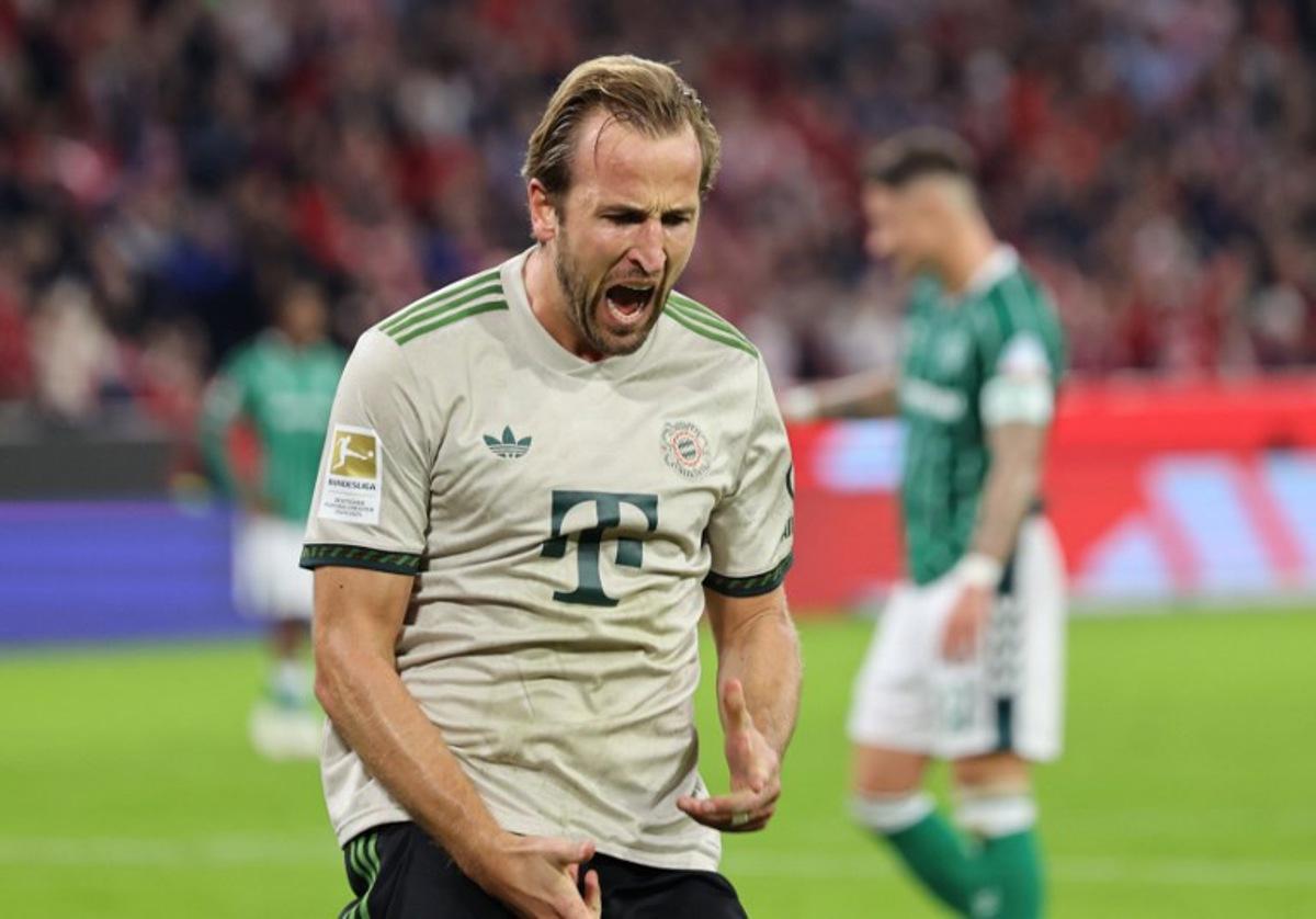 Bayern Munich's English forward #09 Harry Kane celebrates scoring a penalty during the German first division Bundesliga football match between Bayern Munich and Werder Bremen in Munich on Spetember 26, 2025. Alexandra BEIER / AFP