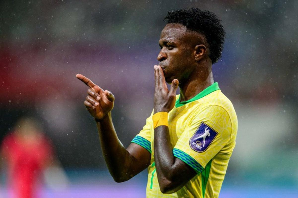 Brazil's Vinícius Jr. celebrates scoring a goal during a friendly football match between South Korea and Brazil at Seoul World Cup Stadium in Seoul on October 10, 2025. ANTHONY WALLACE / AFP