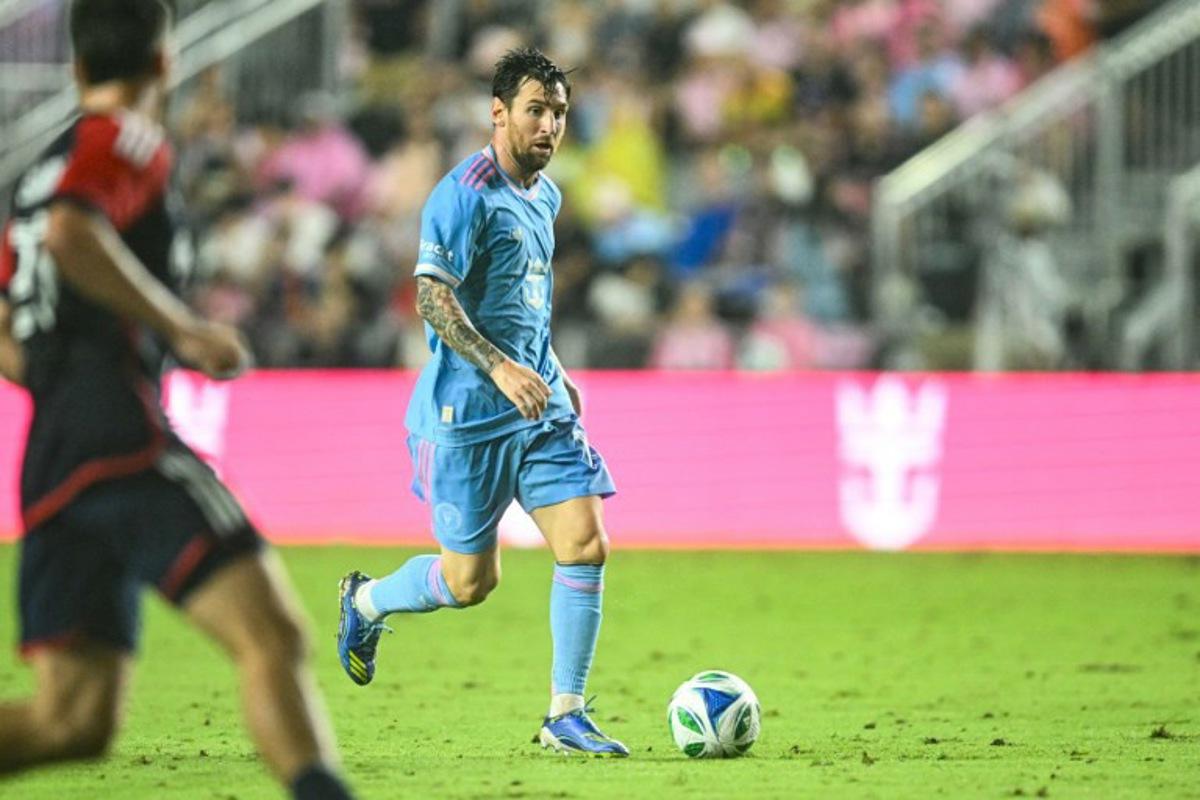 Inter Miami's Argentine forward #10 Lionel Messi runs with the ball during the Major League Soccer (MLS) regular season football match between Inter Miami CF and New England Revolution at Chase Stadium in Fort Lauderdale, Florida, on October 4, 2025. CHANDAN KHANNA / AFP
